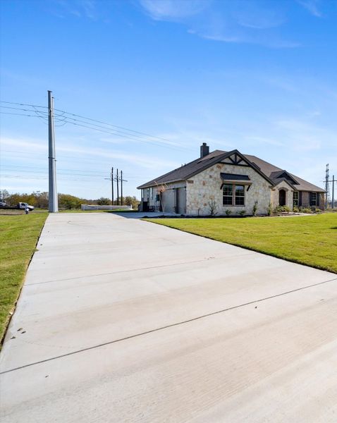 Front exterior of a new home in Parker Heights, Valley View, TX, highlighting curb appeal (Image 28). Front exterior of a new home in Parker Heights, Valley View, TX, highlighting curb appeal (Image 28).