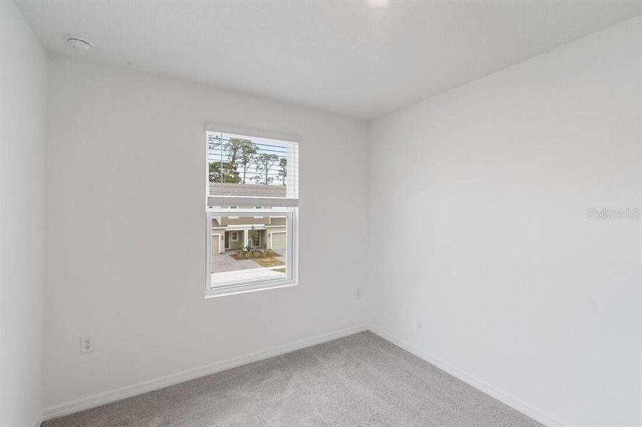 Spacious, unfurnished interior of a new home in Waterstone Townhomes, Groveland (Image 22).