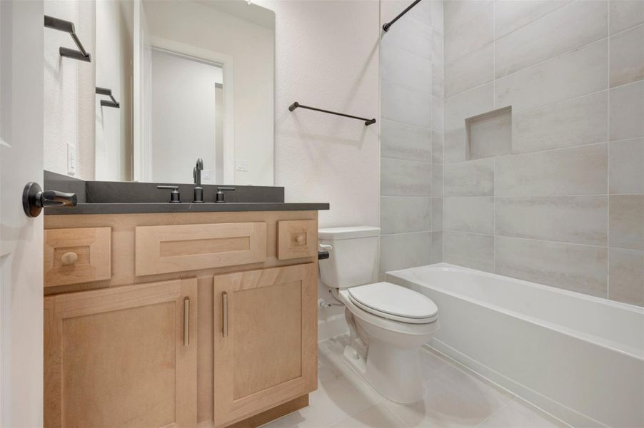 Furnished interior view inside a new home in Harvest Green - Reserve Collection, Richmond (Image 6).