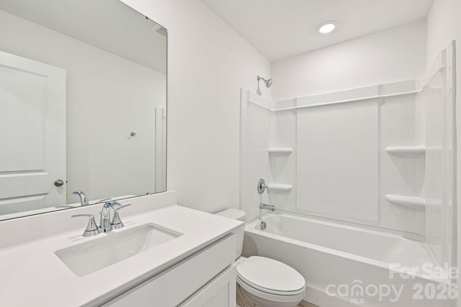Furnished interior view inside a new home in Harper Landing, Stanley (Image 6).