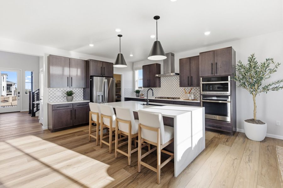 Representative furnished interior of a home built from the 4904 by Risewell Homes in The Aurora Highlands, Aurora (Image 7).