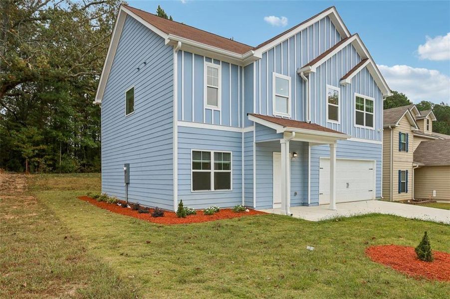 Front exterior of a new home in , Fairburn, GA, highlighting curb appeal (Image 26).
