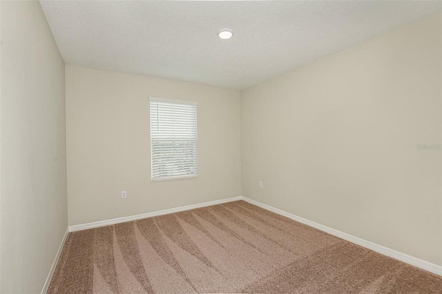 Spacious, unfurnished interior of a new home in Scenic Terrace, Haines City (Image 18).