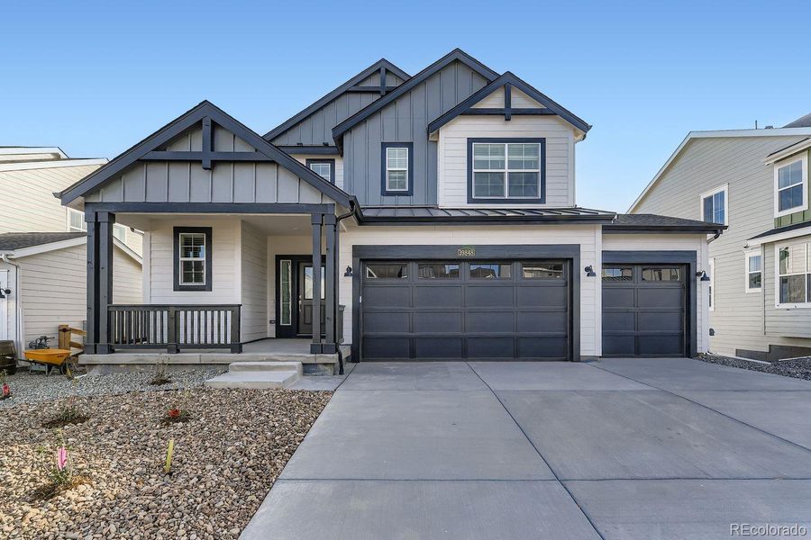 Front exterior of a new home in Independence: The Pioneer Collection, Elizabeth, CO, highlighting curb appeal (Image 1).