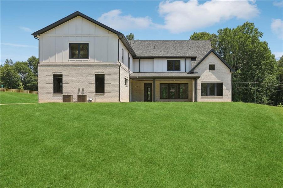 Front exterior of a new home in , Braselton, GA, highlighting curb appeal (Image 51).