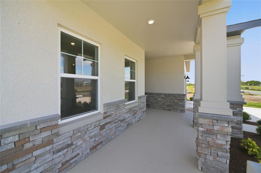Exterior details and patio area of a home in Tyson Reserve, St. Cloud (Image 4).