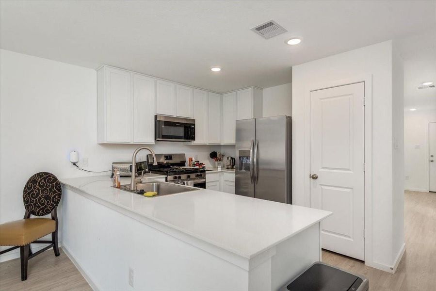Furnished interior view inside a new home in Tavola, New Caney (Image 10).