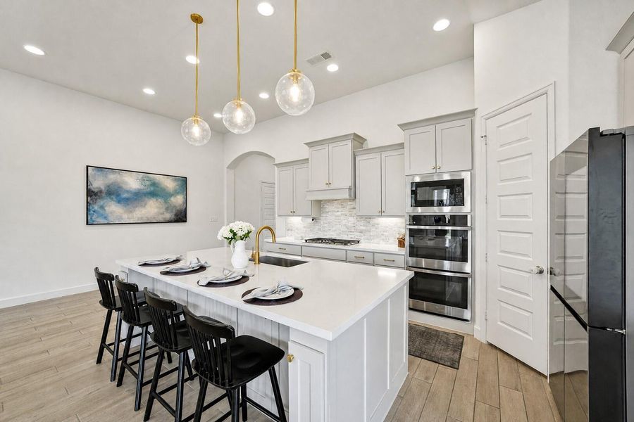 Furnished interior view inside a new home in Artavia, Conroe (Image 10).
