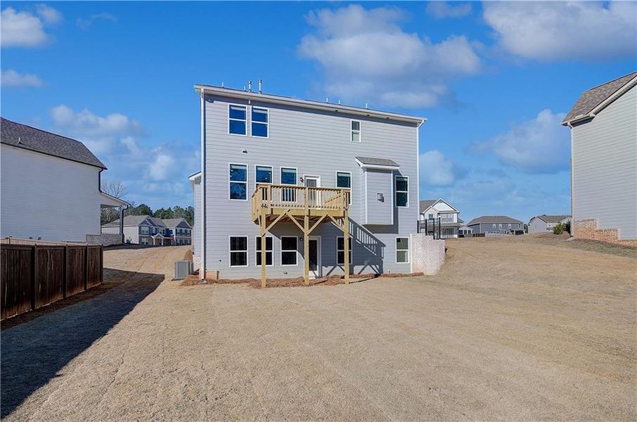 Exterior details and patio area of a home in Kingston, Locust Grove (Image 17).