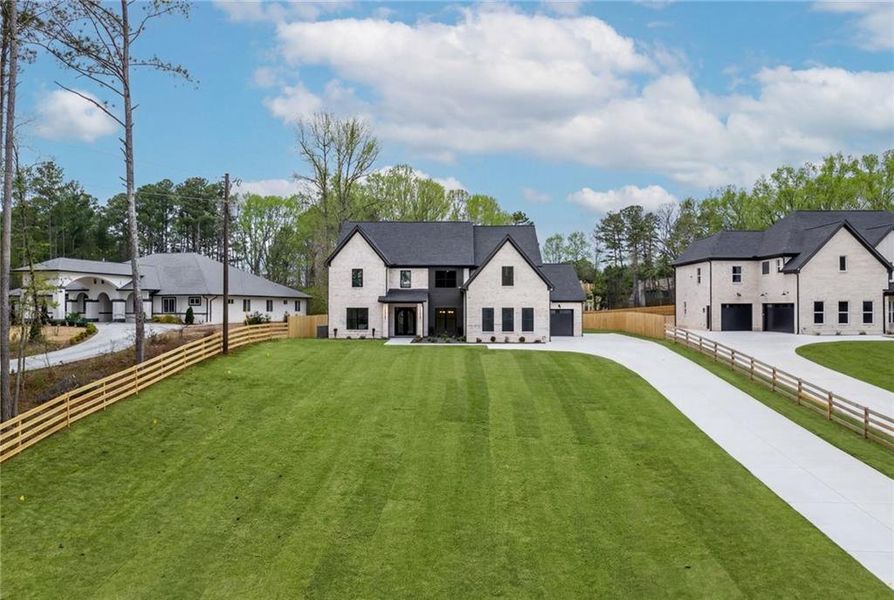 Front exterior of a new home in , Dacula, GA, highlighting curb appeal (Image 27).