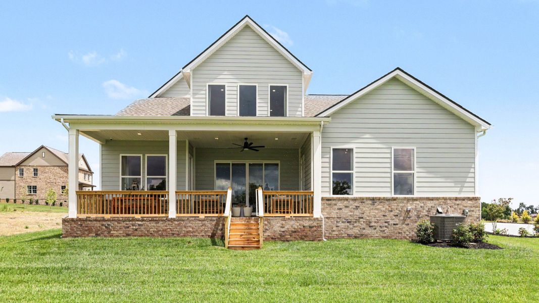 Rear exterior with view of rear covered patio