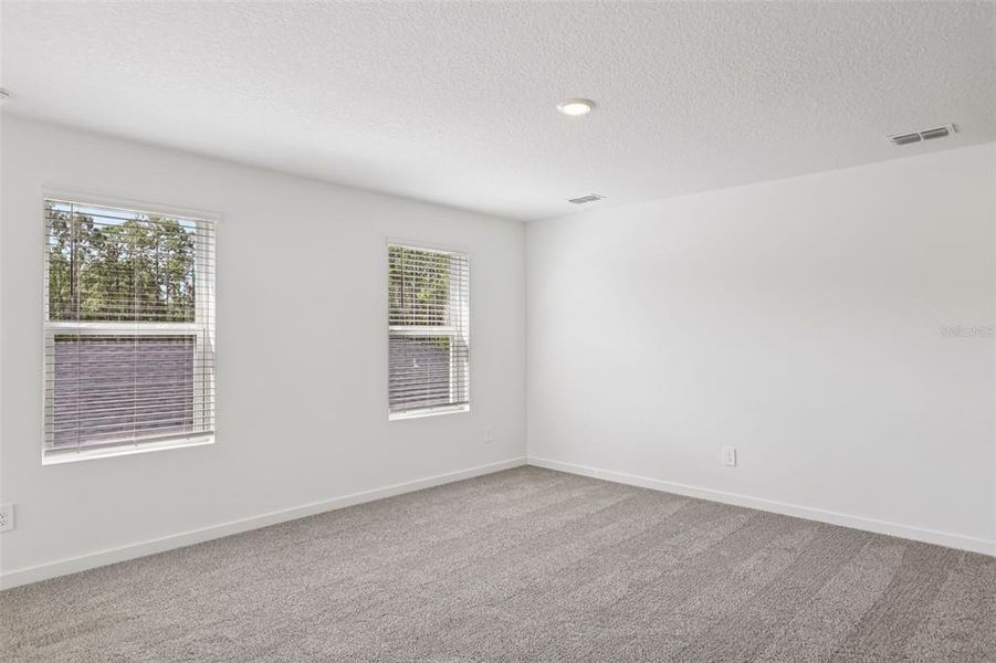 Spacious, unfurnished interior of a new home in Flagler Village - Classic Series, Palm Coast (Image 30). Spacious, unfurnished interior of a new home in Flagler Village - Classic Series, Palm Coast (Image 30).