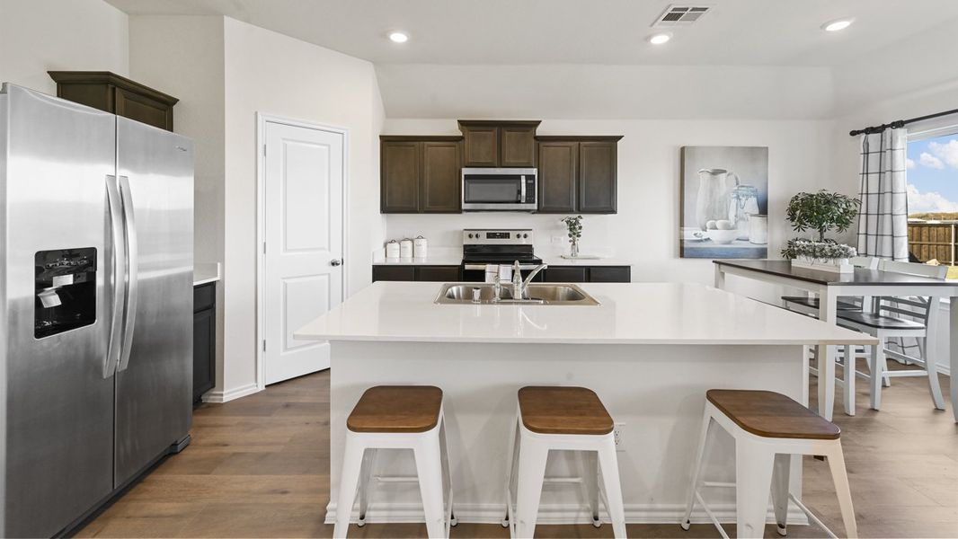 Representative furnished interior of a home built from the Zavalla by D.R. Horton in Oak Valley Estates, Bullard (Image 6).