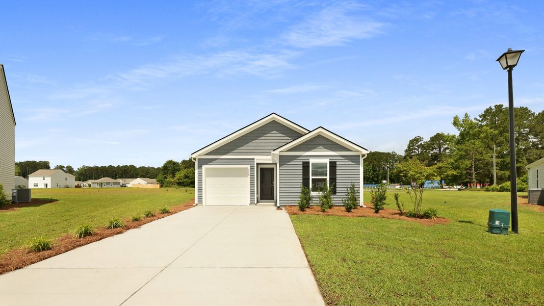 Front exterior of a new home in Evergreen, Holly Hill, SC, highlighting curb appeal (Image 15).