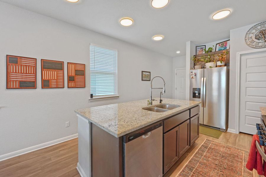 Furnished interior view inside a new home in Stallion Run, Buda (Image 7).