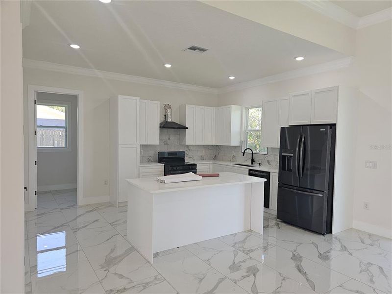 Furnished interior view inside a new home in , Kissimmee (Image 3). Furnished interior view inside a new home in , Kissimmee (Image 3).