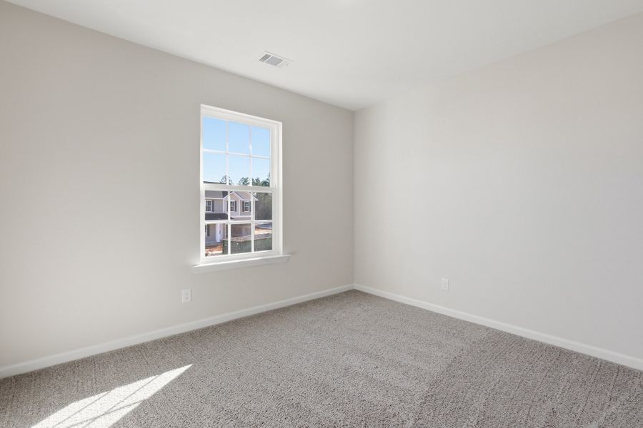 Representative unfurnished interior of a home built from the The Porter by RTS Homes in The Pointe at Villages on Marne, Hinesville (Image 24).