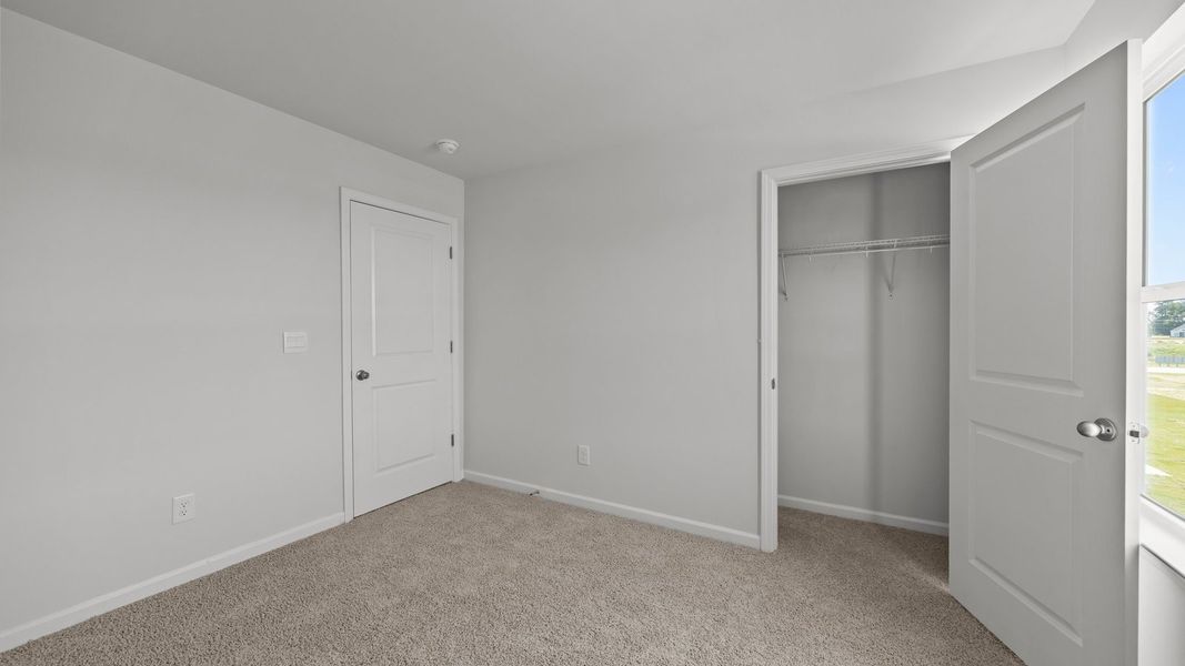 Spacious, unfurnished interior of a new home in East Ridge, Ayden (Image 30). Spacious, unfurnished interior of a new home in East Ridge, Ayden (Image 30).