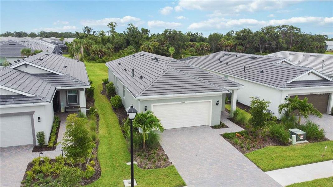Front exterior of a new home in , Englewood, FL, highlighting curb appeal (Image 27).