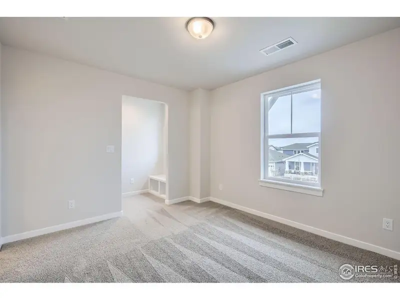 Spacious, unfurnished interior of a new home in RainDance, Windsor (Image 38).