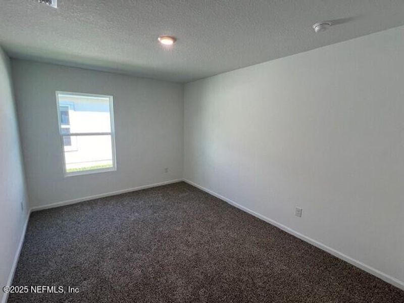Spacious, unfurnished interior of a new home in Sawmill Branch Express, Palm Coast (Image 37).