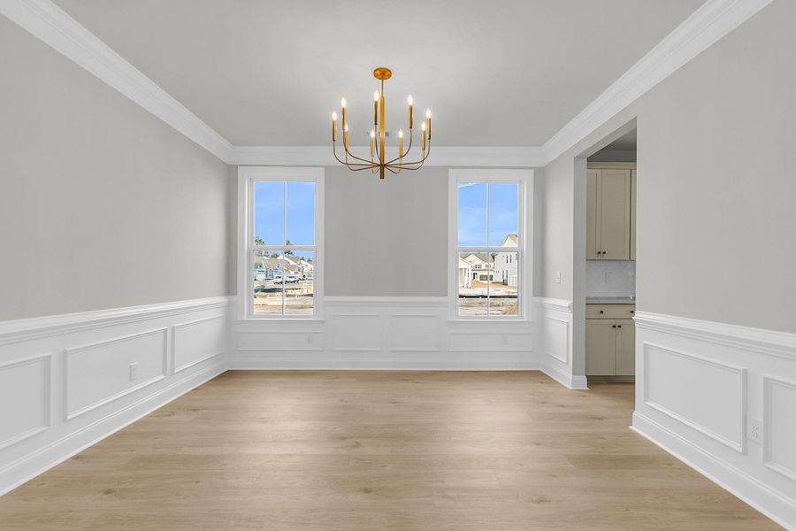 Spacious, unfurnished interior of a new home in Tidewater at Lakes of Cane Bay, Summerville (Image 33).