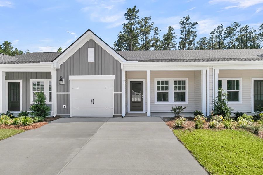 Front exterior of a new home in Hammock Walk at Nexton, Summerville, SC, highlighting curb appeal (Image 1). Front exterior of a new home in Hammock Walk at Nexton, Summerville, SC, highlighting curb appeal (Image 1).