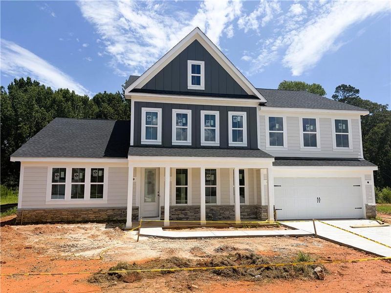 In-progress construction of a new home in Hidden Fields, Hoschton, GA (Image 5).