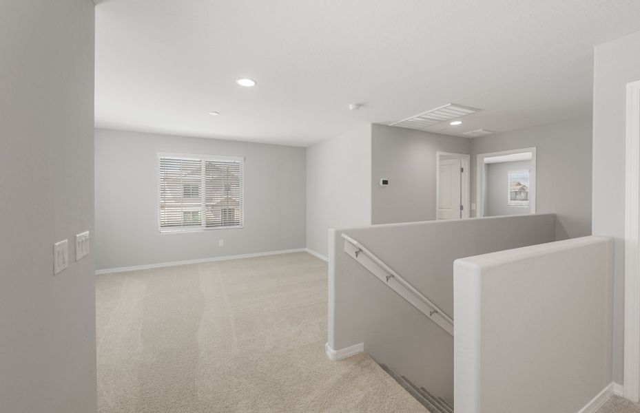 Spacious, unfurnished interior of a new home in Asante- Atrium Series, Surprise (Image 20).