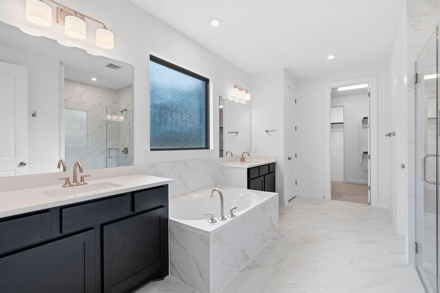 Primary Bath retreat with dual vanities & garden tub