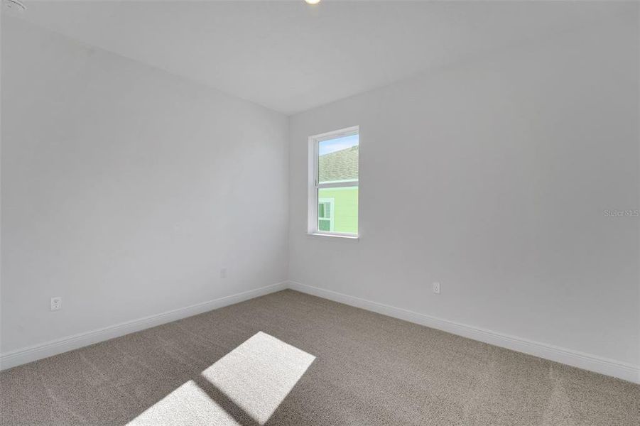 Spacious, unfurnished interior of a new home in Green Key Village, Lady Lake (Image 23).