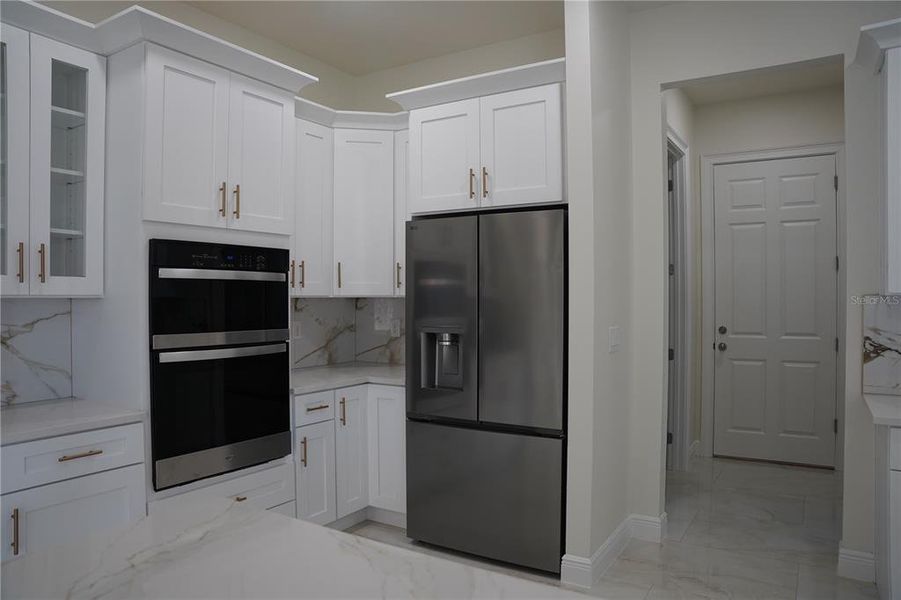 Furnished interior view inside a new home in , Clermont (Image 3).