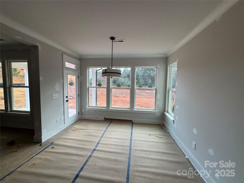 Breakfast area leads to covered porch