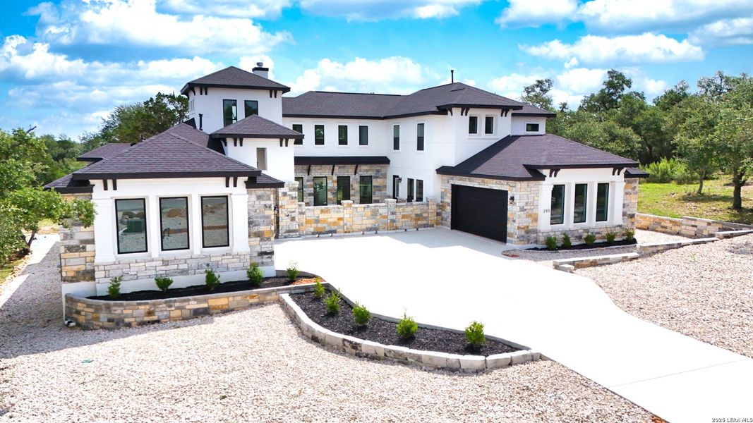 Front exterior of a new home in , New Braunfels, TX, highlighting curb appeal (Image 28).