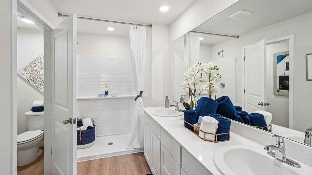 Furnished interior view inside a new home in Coral Bay - Express & Tradition, North Fort Myers (Image 25).