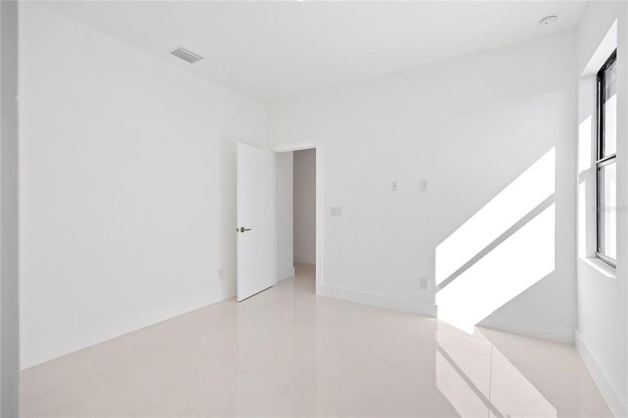 Spacious, unfurnished interior of a new home in , Port Charlotte (Image 37).