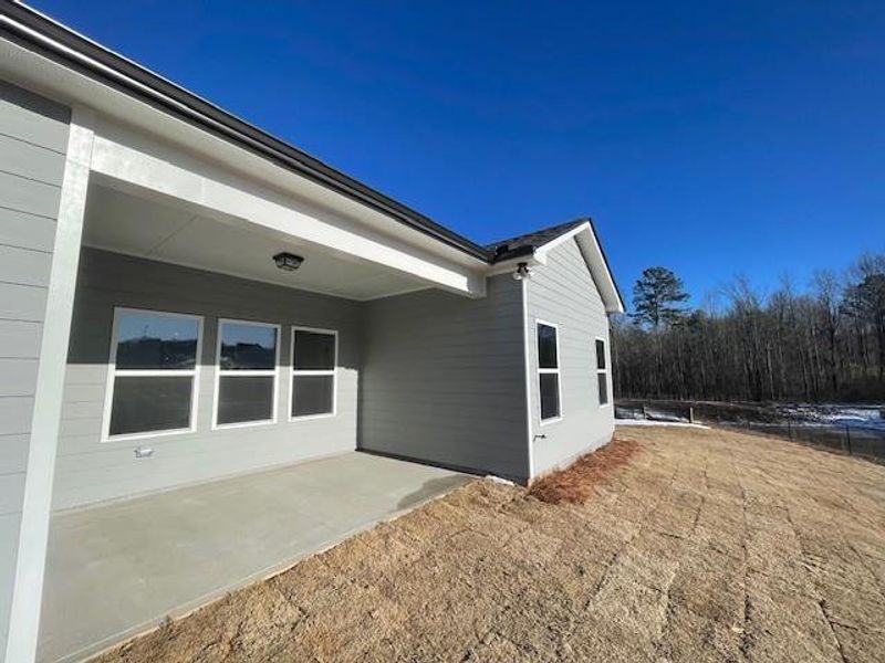 Exterior details and patio area of a home in Ponderosa Farms Estates, Gainesville (Image 4).
