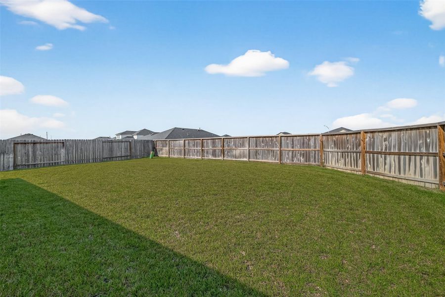 Ample room for a pool, garden, or future outdoor enhancements.