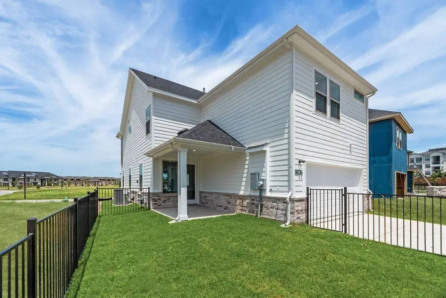 Exterior details and patio area of a home in Bayside, Rowlett (Image 26). Exterior details and patio area of a home in Bayside, Rowlett (Image 26).