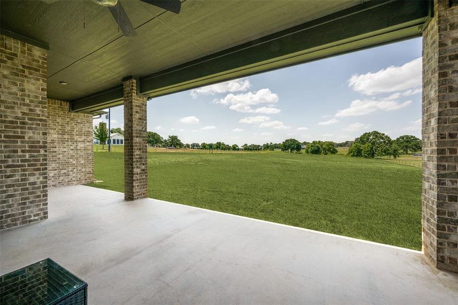 View of patio with ceiling fan