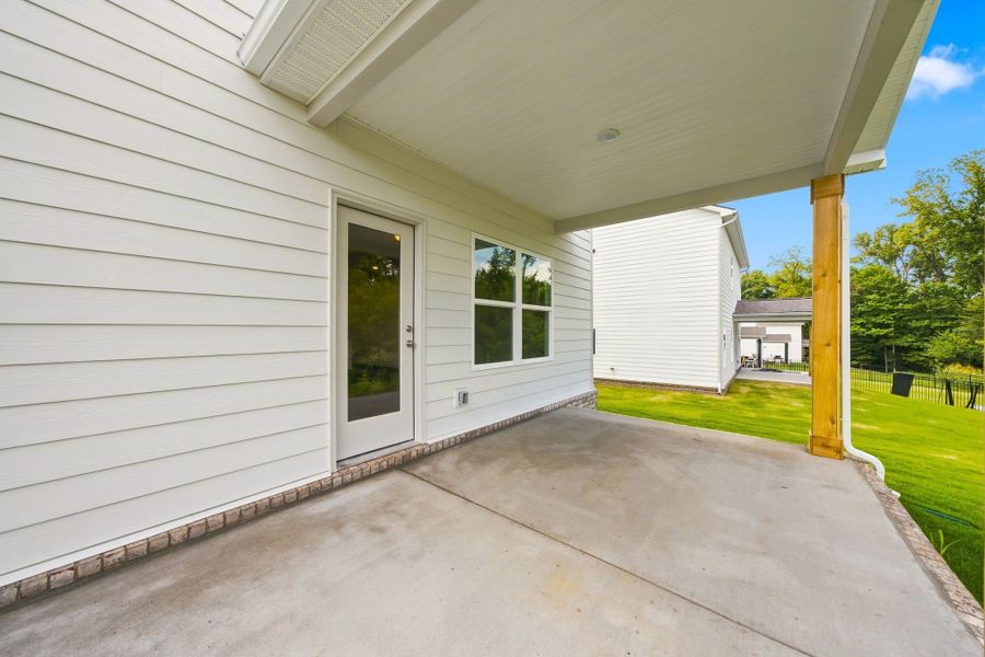 Exterior details and patio area of a home in The Oaks, Clarksville (Image 3).