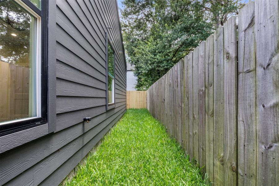 Exterior details and patio area of a home in , Houston (Image 4). Exterior details and patio area of a home in , Houston (Image 4).