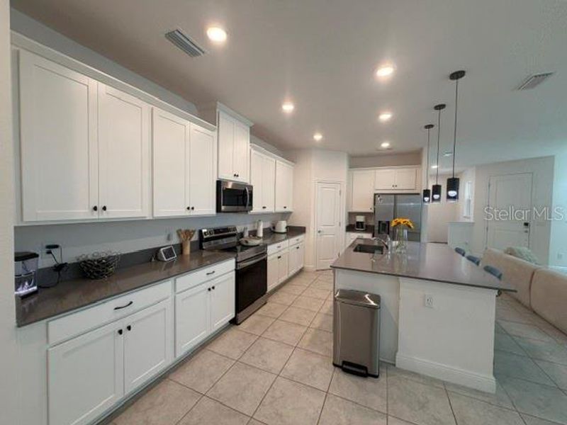 Furnished interior view inside a new home in , St. Cloud (Image 6).