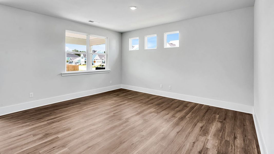 Spacious, unfurnished interior of a new home in The Haven at Indigo Preserve, Leland (Image 14).