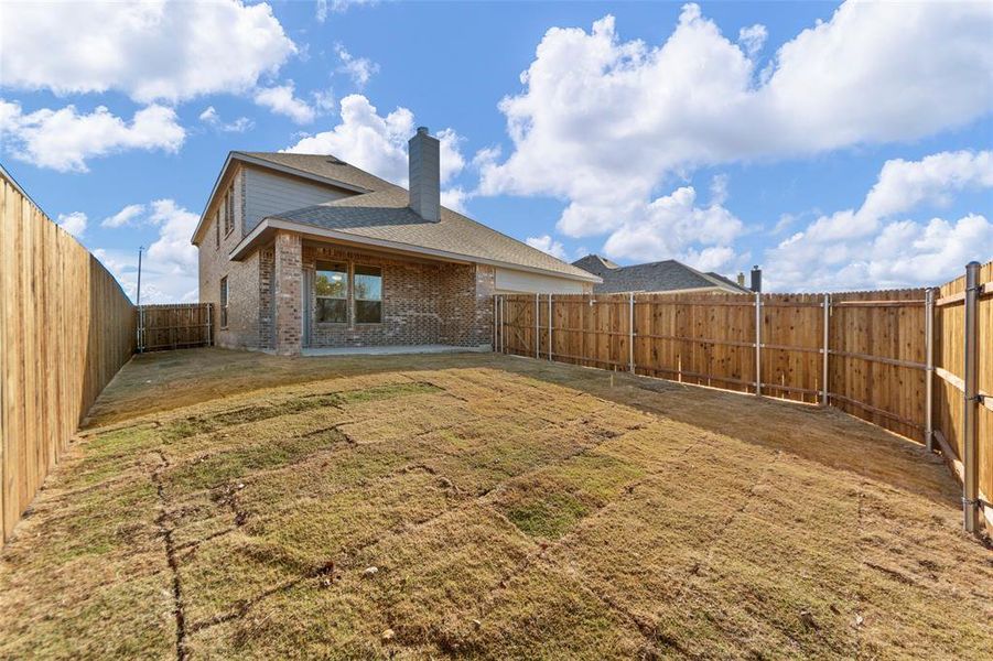 Back of house featuring a patio area