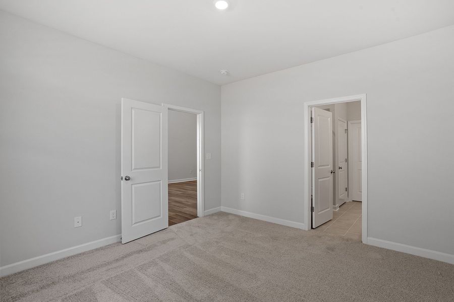 Spacious, unfurnished interior of a new home in Ovation at Sweetbrier, Durham (Image 21).