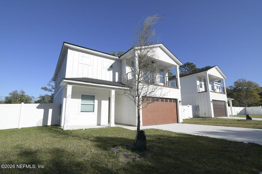 Front exterior of a new home in , Jacksonville, FL, highlighting curb appeal (Image 21).