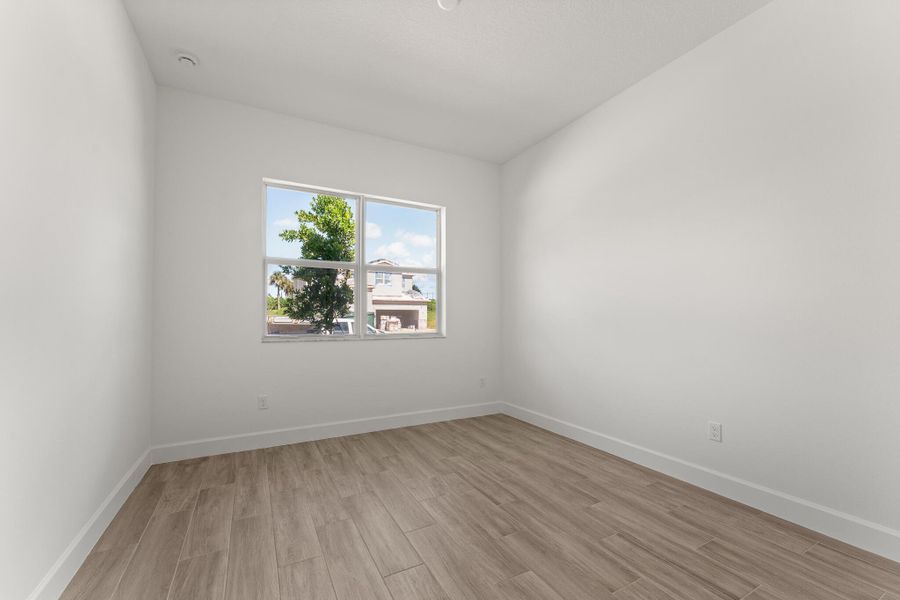 Spacious, unfurnished interior of a new home in Tradition - Seville, Port St. Lucie (Image 10). Spacious, unfurnished interior of a new home in Tradition - Seville, Port St. Lucie (Image 10).