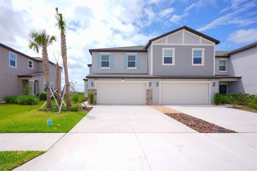 Front exterior of a new home in , San Antonio, FL, highlighting curb appeal (Image 27).
