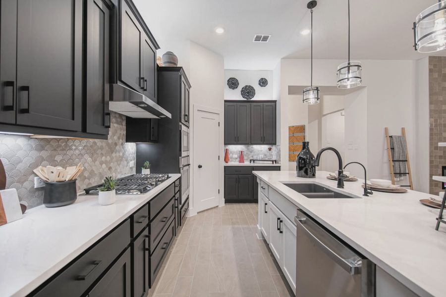 Representative furnished interior of a home built from the Charlene by Chesmar Homes in Meyer Ranch, New Braunfels (Image 12).
